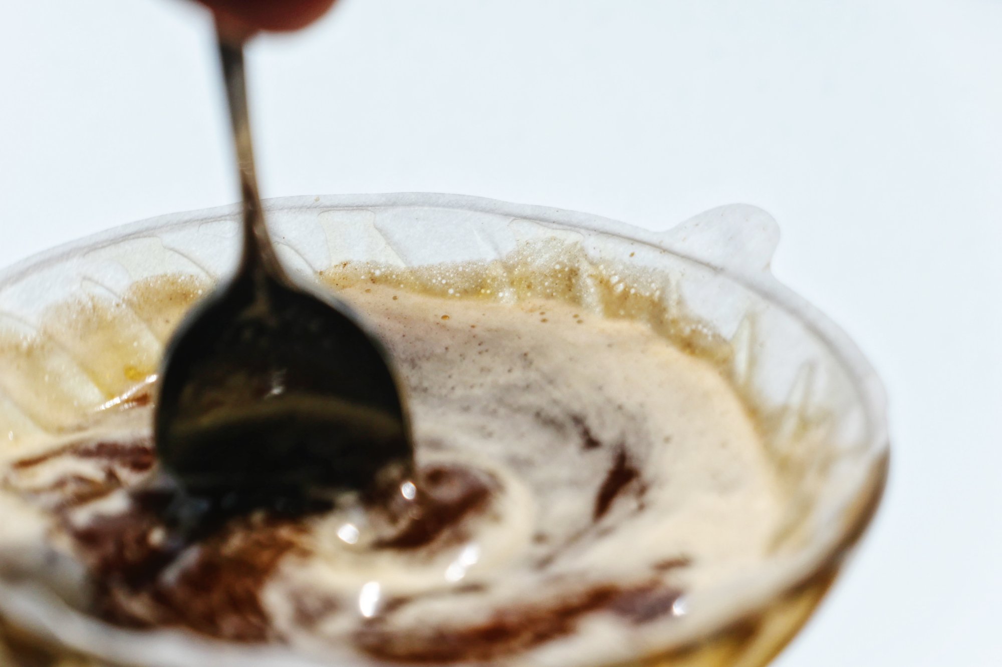 Espresso extracting into two cups on the machine